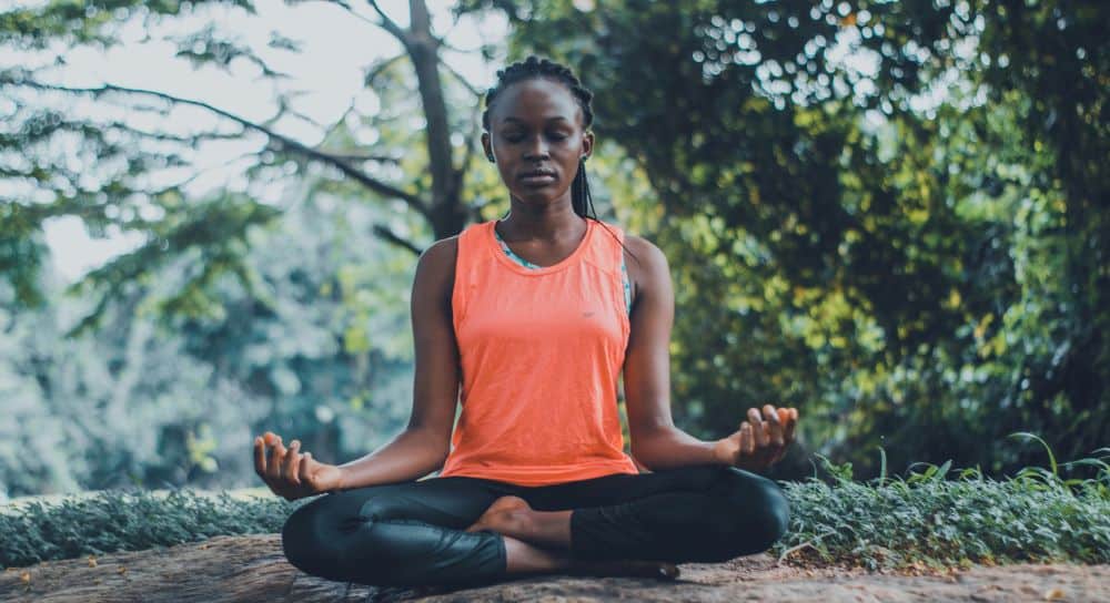 A lady practicing a mindfulness meditation.