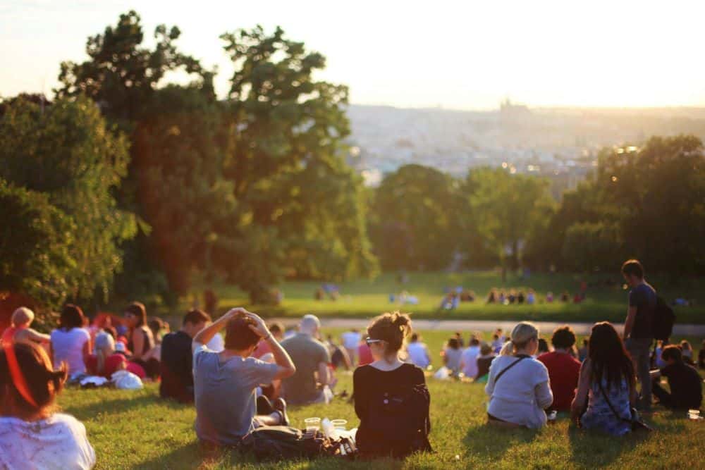 family and friends in the park representing self-awareness of the influence your family plays