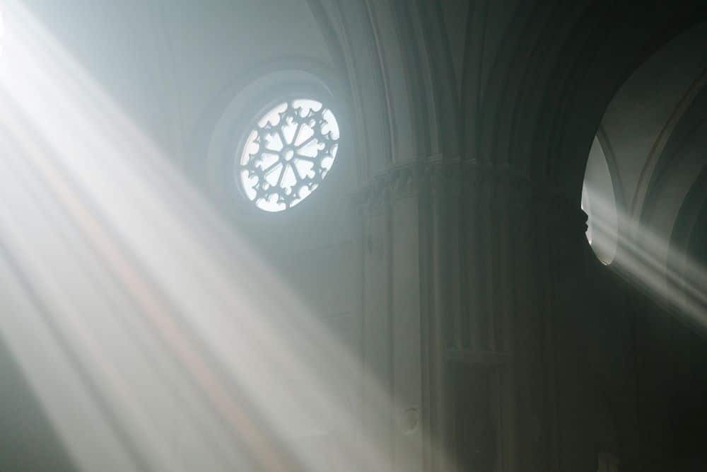 Light shining through windows representing journey to enlightenment