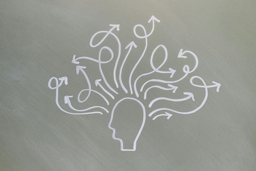 Illustration of the brain going in different ways - shadow work psychology